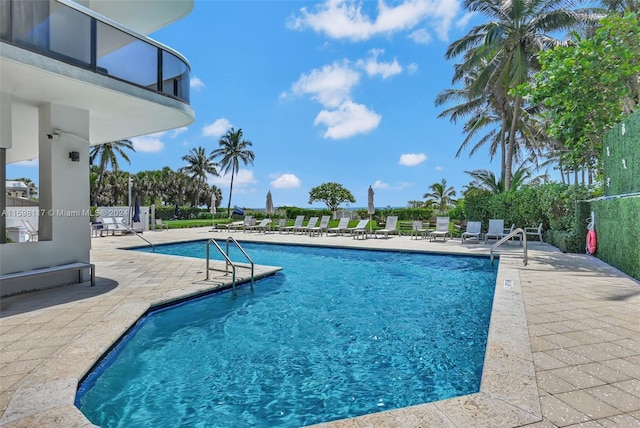 9455 Collins Ave Unit 809, Surfside, FL 33154 - pool with a patio