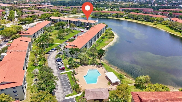 birds eye view of property featuring a water view