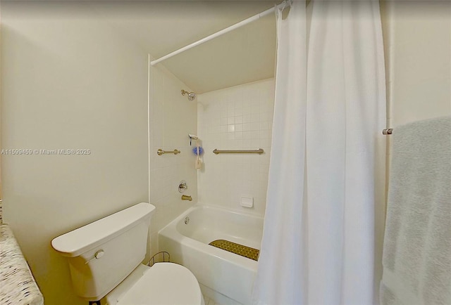 bathroom featuring shower / bathtub combination with curtain and toilet