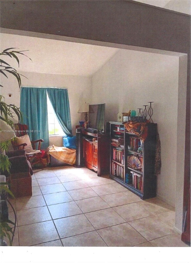 interior space with light tile patterned floors