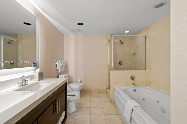 full bath with toilet, visible vents, vanity, a jetted tub, and a shower stall