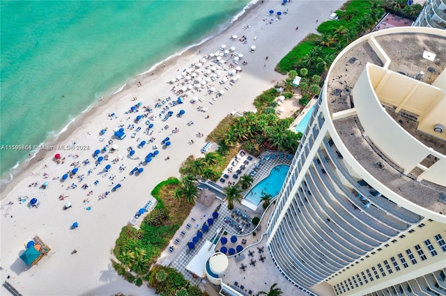 aerial view featuring a water view and a view of the beach