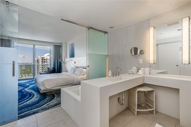 bathroom featuring tile patterned floors and sink