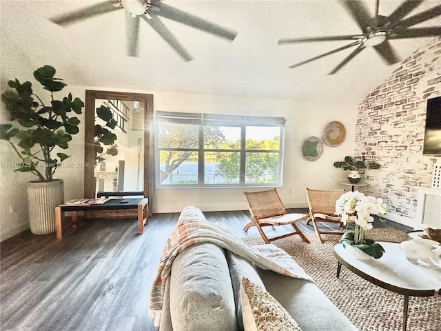 living room featuring ceiling fan, hardwood / wood-style flooring, and pool table