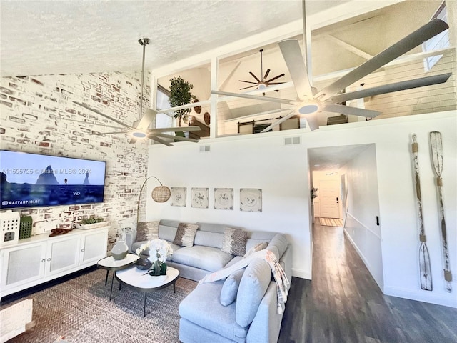 living room featuring high vaulted ceiling, a textured ceiling, dark hardwood / wood-style floors, and ceiling fan