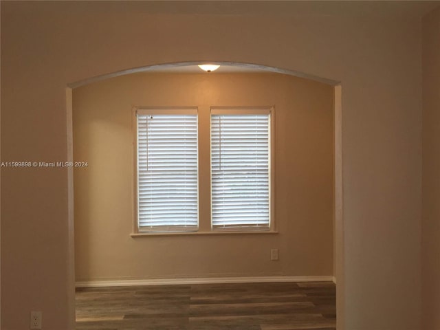 empty room featuring dark hardwood / wood-style floors