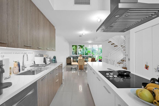 kitchen featuring white cabinetry, sink, extractor fan, black electric cooktop, and light tile patterned floors