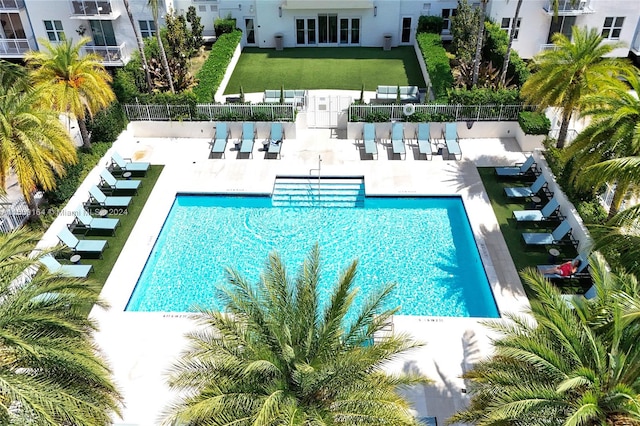 community pool featuring a patio area