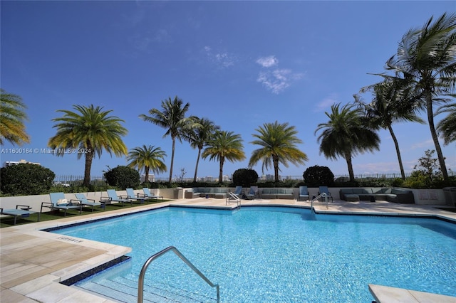 view of swimming pool featuring a patio area