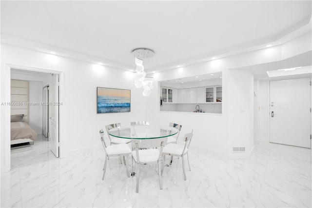 dining space featuring light tile patterned flooring