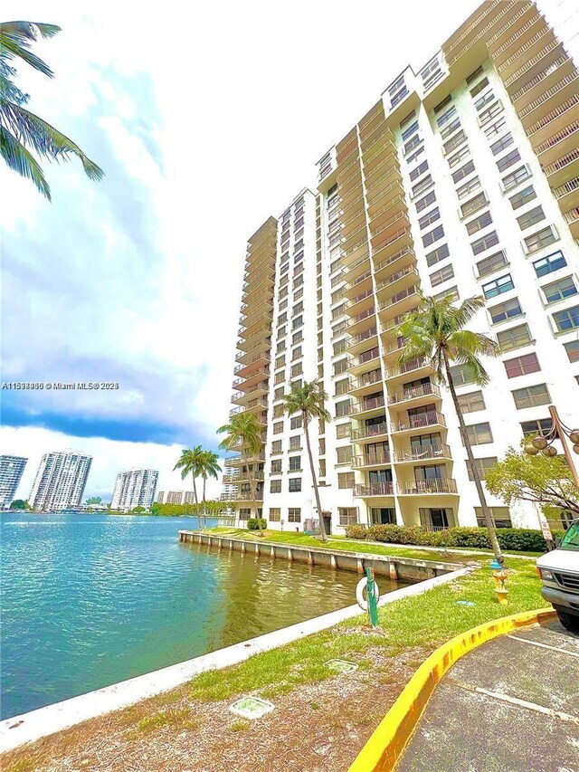 view of property with a water view