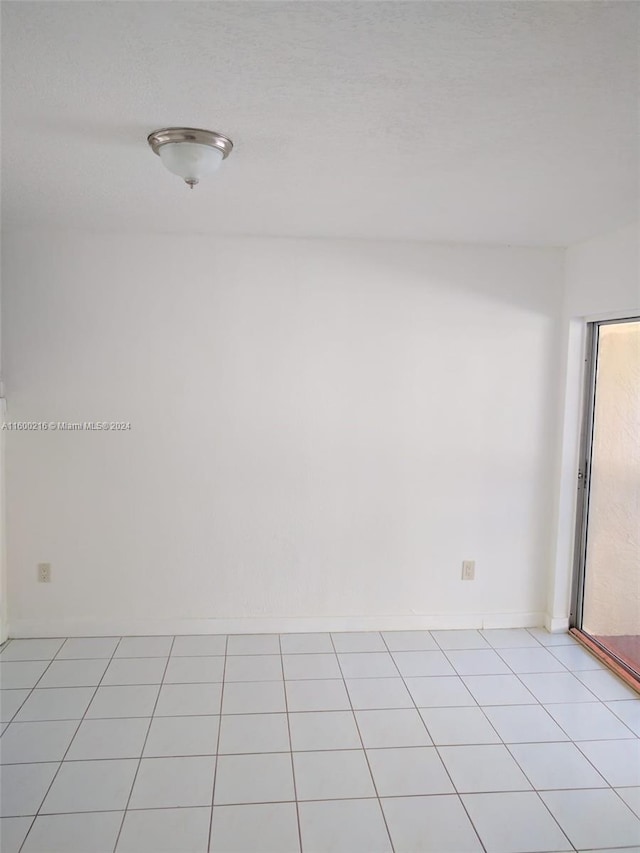 view of tiled empty room