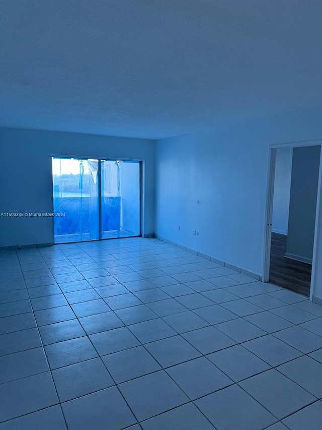 400 Kings Point Dr Unit 719, Sunny Isles Beach, FL 33160 - empty room with light tile patterned flooring and baseboards