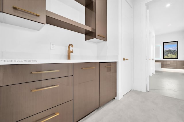 bathroom with concrete floors and vanity