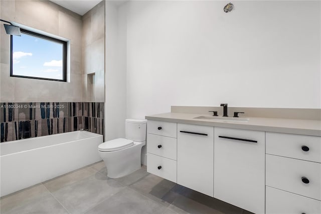 bathroom featuring bathing tub / shower combination, toilet, vanity, and tile patterned flooring