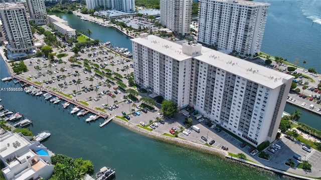 aerial view with a city view and a water view