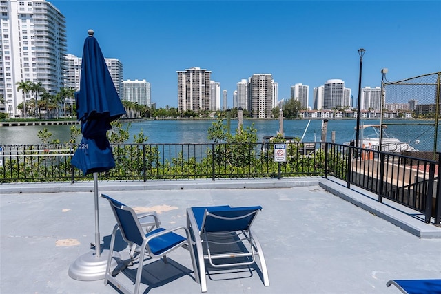 view of patio with a water view