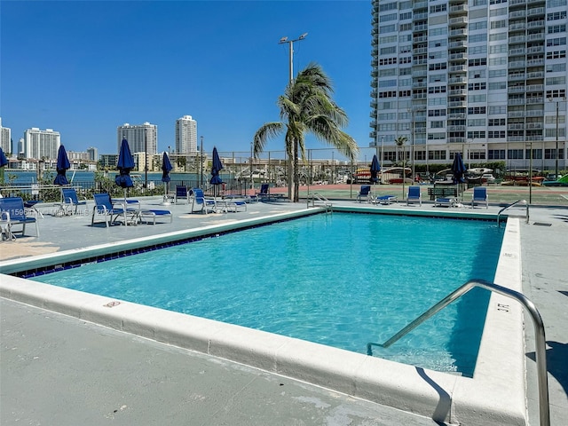 view of swimming pool with a patio