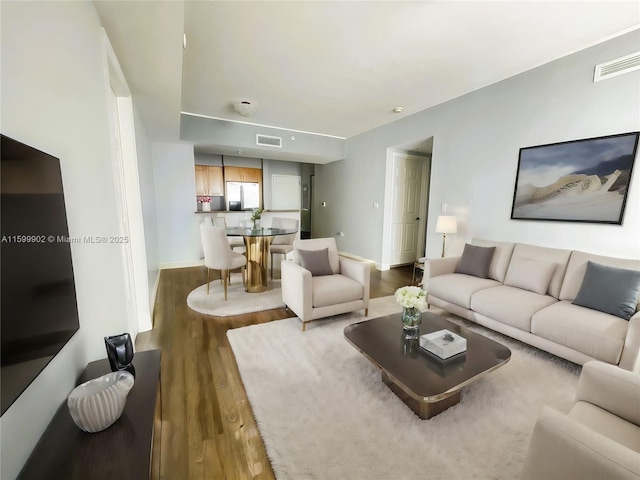 living room with wood-type flooring