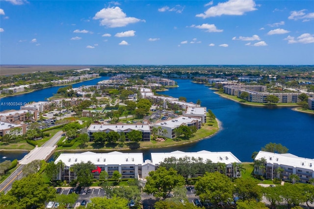 drone / aerial view with a water view