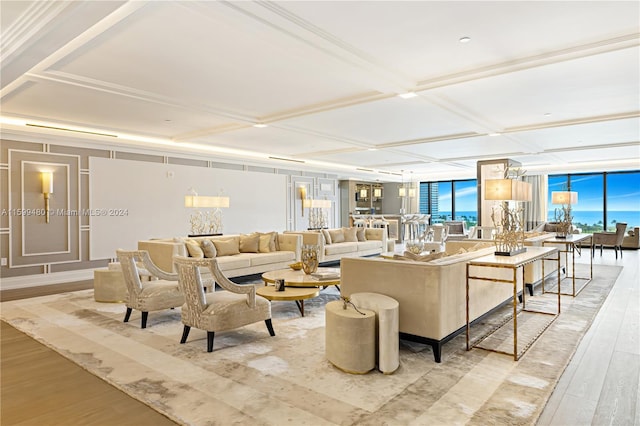 living room featuring light hardwood / wood-style floors and coffered ceiling