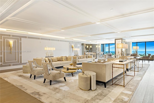 living room with coffered ceiling and light wood-style flooring