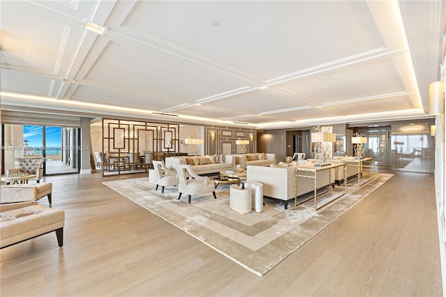 living room with light hardwood / wood-style floors and coffered ceiling