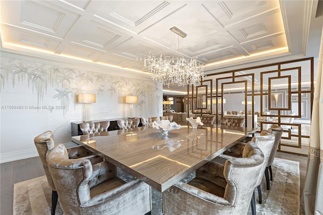 dining area with hardwood / wood-style flooring, a notable chandelier, crown molding, and coffered ceiling