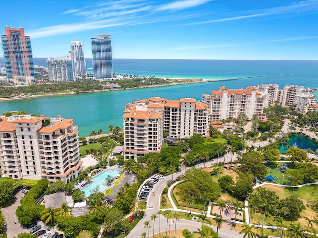 aerial view featuring a view of city and a water view