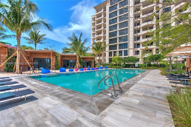 pool featuring a patio area