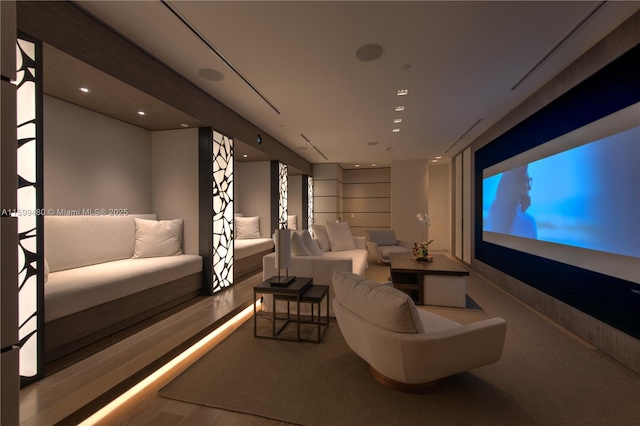 cinema room featuring wood finished floors and recessed lighting