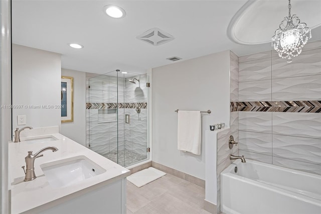 bathroom featuring independent shower and bath, double sink vanity, a chandelier, and tile floors