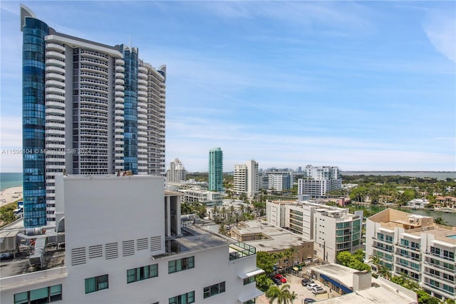 property's view of city featuring a water view