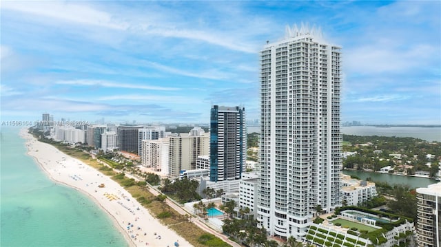 exterior space featuring a view of the beach and a water view