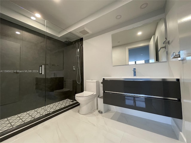 bathroom featuring an enclosed shower, vanity, and toilet