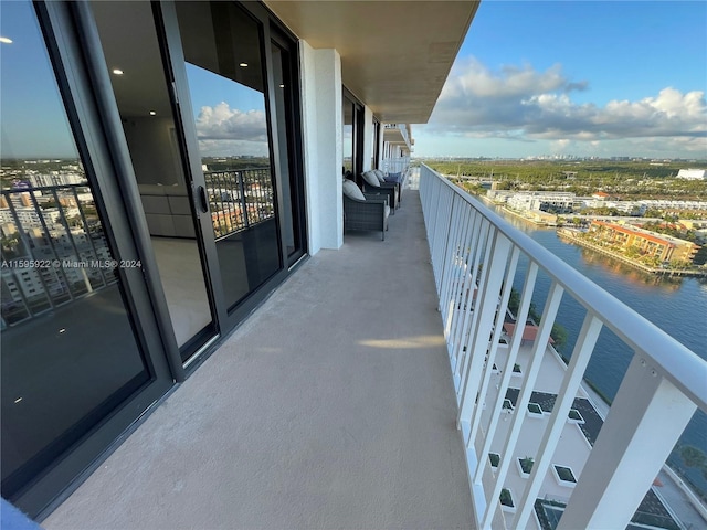 balcony featuring a water view