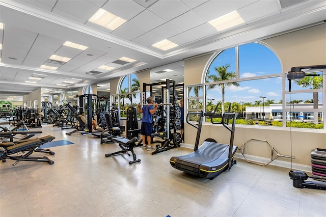 gym with ornamental molding