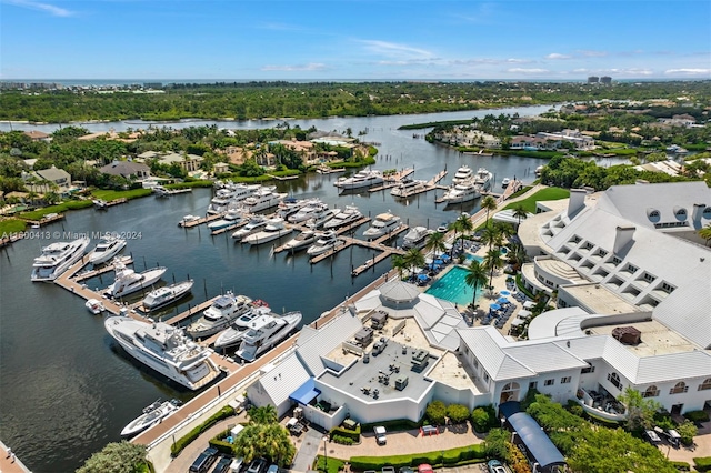 birds eye view of property with a water view