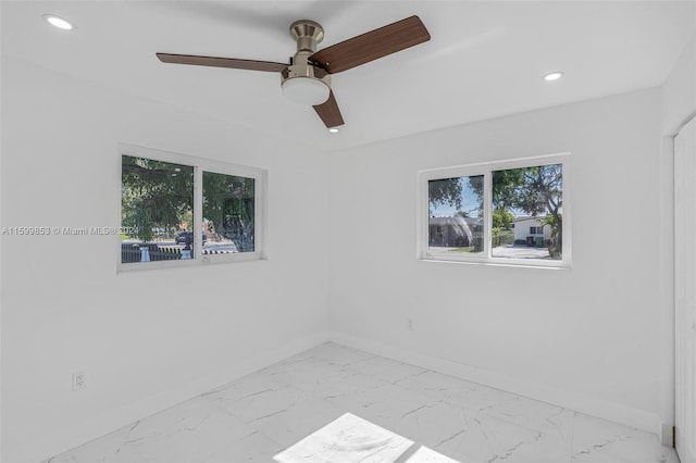 empty room featuring ceiling fan