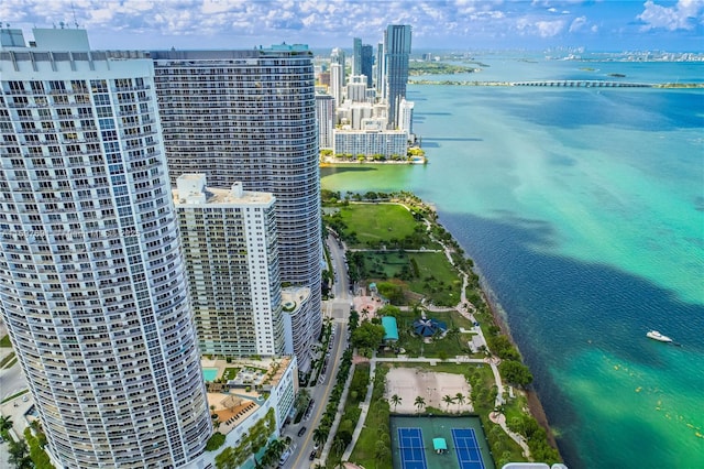 bird's eye view featuring a water view and a city view