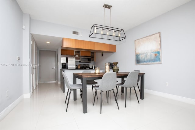 dining space with recessed lighting, baseboards, and visible vents