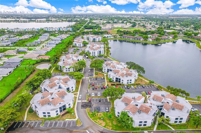 bird's eye view with a water view