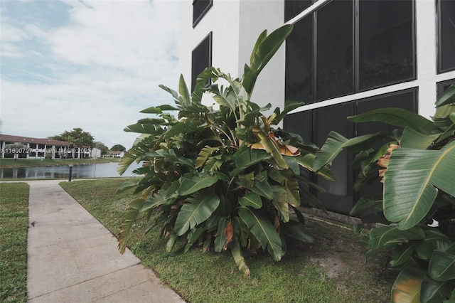 exterior details with a water view