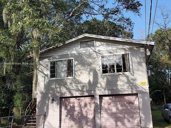 exterior space featuring a garage