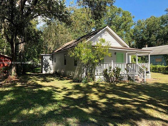 exterior space with a front lawn