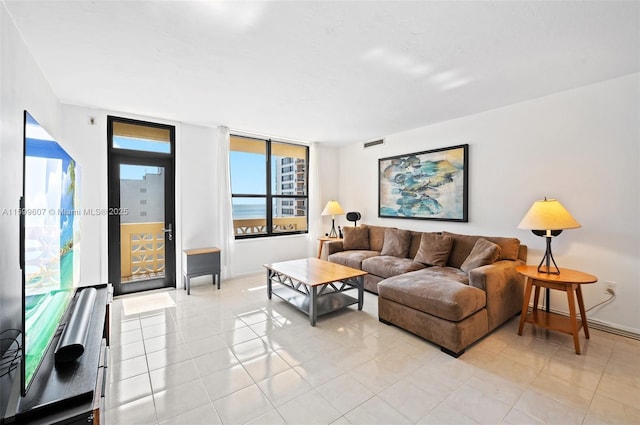 living room featuring light tile patterned floors