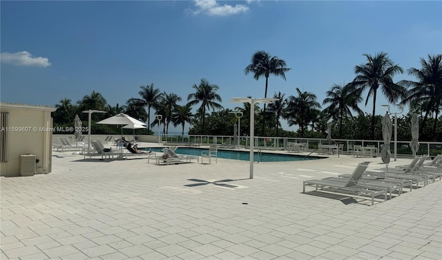 view of swimming pool featuring a patio area