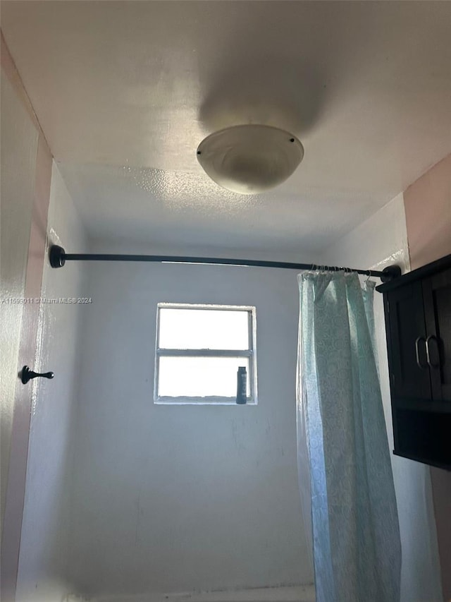 bathroom with walk in shower