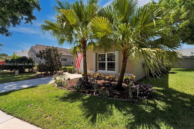 view of front of house with a front lawn