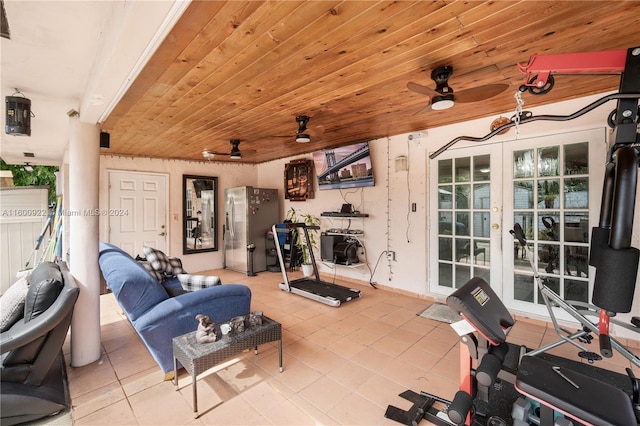 living room with ceiling fan, french doors, wood ceiling, and light tile floors